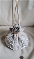 Hand crocheted string drawn bag purse with beads
