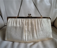 ANDE shimmering gold tone fabric clutch handbag