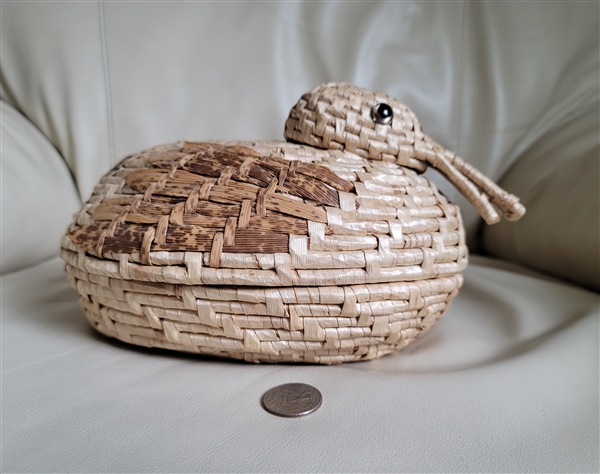 Vintage hand woven straw Duck shaped storage basket.