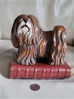 large ceramic lhasa apso dog standing on a book bookend 1970s