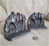 set of vintage cast metal saddled western horse bookends