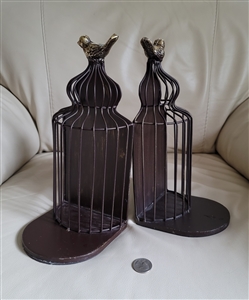 vintage Pier 1 metal birdcage bookends with gold tone bird toppers