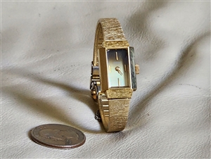 Vintage Citizen womens watch gold tone rectangular case manual wind working showing internal bracelet wear