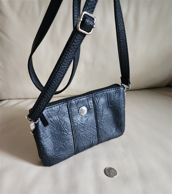 Stone Mountain black three compartments purse shoulder bag and wristlet in textured design and colorful interior lining