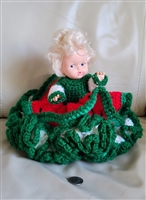 Vintage doll with hand crocheted dress