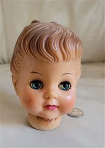 Vintage five inch tall doll head with eyes