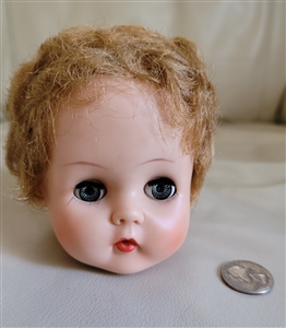 Vintage rubber doll head working eyes for parts