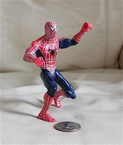 Preowned unbranded red and blue kneeling Spiderman plastic action figure toy with articulated limbs