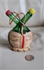 Green glass Cruets set in woven basket Italy
