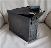 Vintage olive drab US military 7.62MM metal ammo box with yellow stenciling