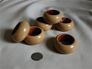 Elegant Woden napkin rings in dark tan color from India