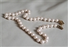 Elegant Monet vintage 16 in faux pearls necklace