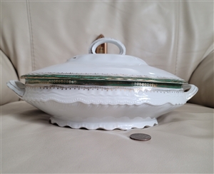 Preowned antique Victoria Austria porcelain oval lidded vegetable serving dish featuring ornate gold and green trim