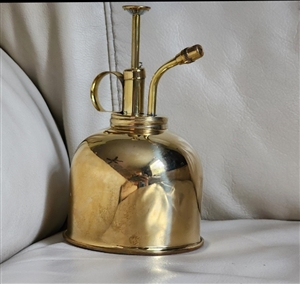 Vintage brass atomizer spray bottle for home or garden use and also decorative display