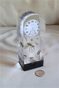 Eruption of time lucite Invicta watch paperweight