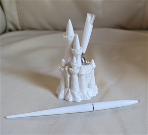White sparkling castle pen and pen holder