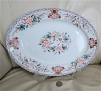 Antique Noritake Berkeley 1912 oval serving plate featuring a geometric border and central hand-painted floral design with gold accents