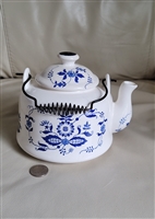 Chadwick CM porcelain teapot with metal handle