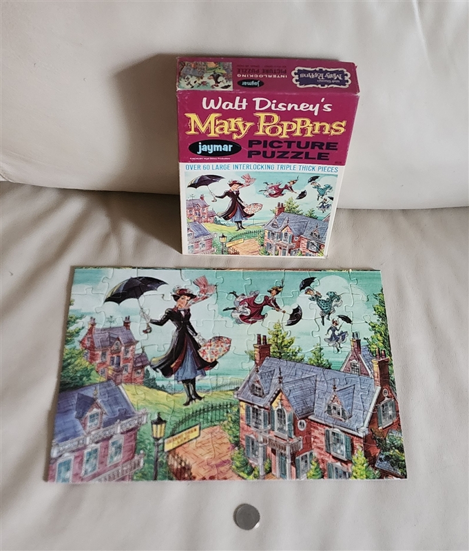 Assembled 1964 Mary Poppins Jaymar puzzle showing Mary flying over Cherry Tree Lane