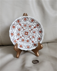 Vintage 1963 Spode Sorrento saucer with brown and orange floral pattern and scalloped rim