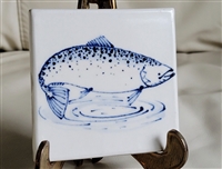 This charming vintage ceramic art tile was created in the 1980s and features the detailed blue salmon artwork of artist Mort. Perfect as an accent piece, a unique gift, or a functional coaster for your home, this tile measures 4-3/8 inches by 4-3/8 inches
