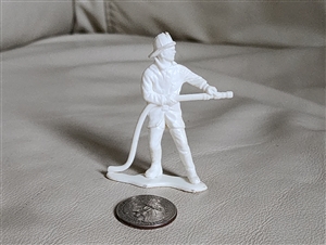 White Firefighter in action plastic decor or toy