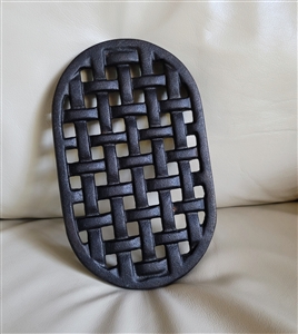 Cast iron trivet in woven design