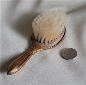 Antique gold tone metal vanity hairbrush