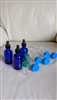 Cobalt blue glass bottles and other storage tubes