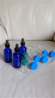 Cobalt blue glass bottles and other storage tubes