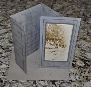 Logging scenery postcard with in a cardboard frame