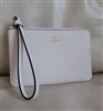 Coach white color wristlet in coated canvas design