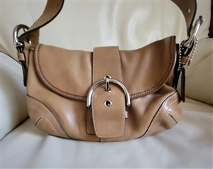 COACH leather purse light brown color great design