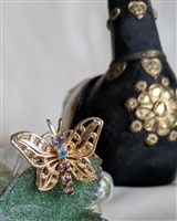 Gold tone butterfly brooch and pendant jewelry