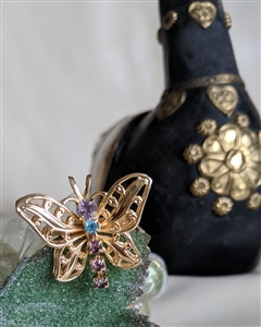 Gold tone butterfly brooch and pendant jewelry