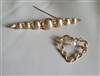 Gold tone two brooches set in elegant design MONET