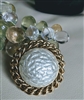 Sarah Cov elegant round brooch in gold tone metal