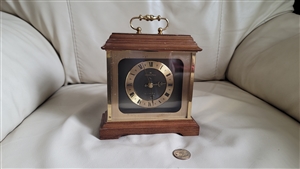 1980s Hamilton West German quartz bracket mantel clock with dark wood case and brass handle preowned vintage sells as is