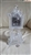 Godinger Crystal Legends ten and a half inch lead crystal grandfather clock with silver face and Roman numerals