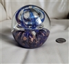 Elaborate glass paperweight in swirl design decor