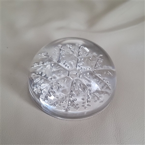 Heavy solid clear glass domed paperweight with a 3D frosted snowflake design on the base preowned Avon France