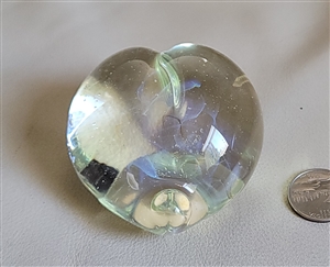 This preowned vintage Gilbert C Johnson 1996 signed veiled studio art glass heart paperweight features an ethereal internal drape