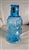 Indiana Glass Tiara Blue Jolly Mountaineer decanter with shot glass hat 37 oz vintage ice blue figural barware