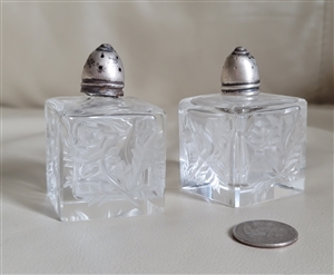 Floral design clear glass shakers with silver tops