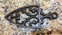 Wilton vintage triangular cast iron trivet