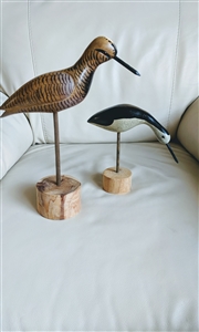 Tall hand carved wooden bird sculpture round base