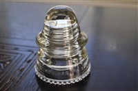 This preowned vintage Hemingray-40 aqua glass utility insulator features its classic embossed design