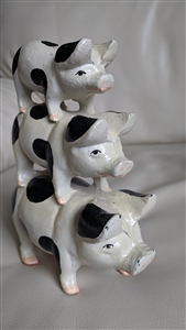 Set of cast iron 3 stack on pigs doorstop bookend