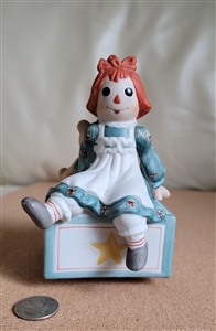 Vintage 1982 Schmid porcelain rotating 6 inch music box featuring Raggedy Ann and a teddy bear