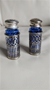 Cobalt blue cage encased salt and pepper shakers